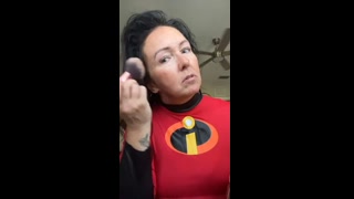 Ishrn puts on her Incredibles cosplay after a shower