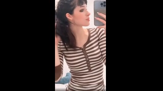 Nora Fawn flaunts her booty by removing her jeans