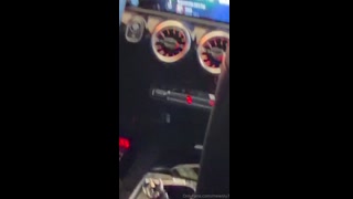 As she knelt on the passenger's seat of his car, he could feel her warm mouth around his cock